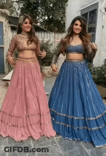 Two Women In Long Skirts GIF