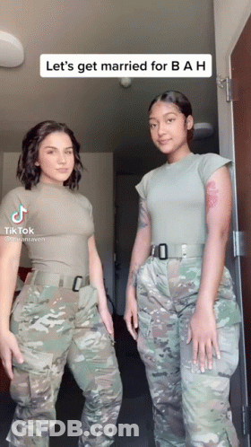 Two Women In Military Uniforms With Marriage Caption GIF