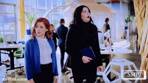 Two Women In Office With SMP GIF