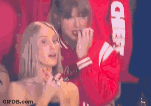 Two Women In Photo Booth GIF