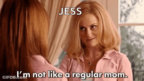 Two Women In Pink Shirts Talking GIF