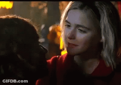 Two Women In Red Sweaters GIF
