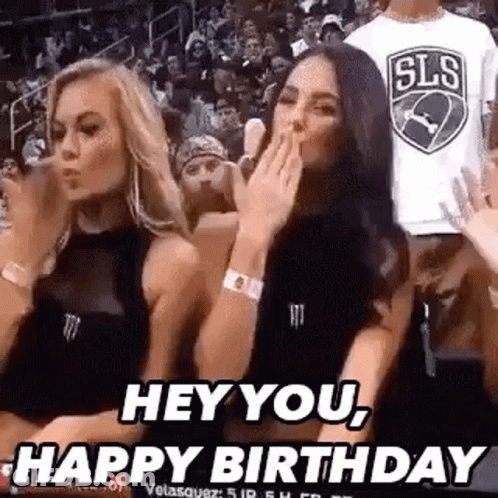 Two Women In Stands One Covering Mouth GIF