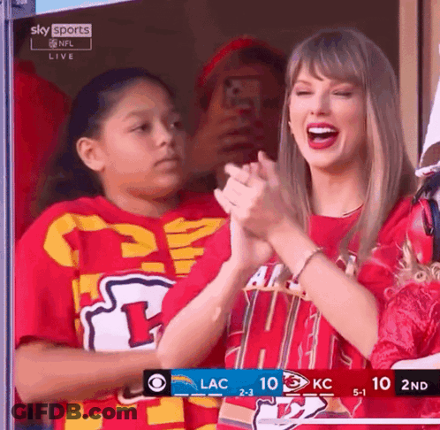 Two Women In Stands With SARS Super Screen GIF