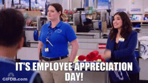 Two Women In Store With Man Talking To Them GIF