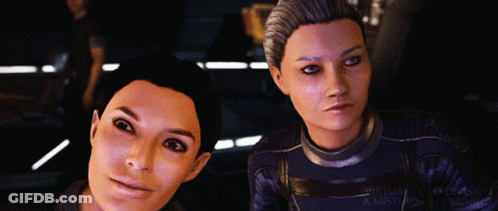Two Women In Video Game Looking At Camera Virtual Collision A Mistake In Training GIF