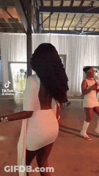Two Women In White Dresses Dancing GIF