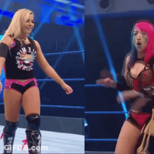 Two Women In Wrestling Ring One With Knee Pads GIF