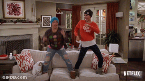 Two Women Jumping On Couch Don't Trip Sweater GIF