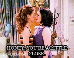 Two Women Kissing Saying Honey You're Really Close GIF
