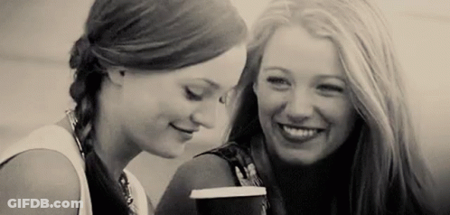 Two Women Laughing Drinking Coffee GIF