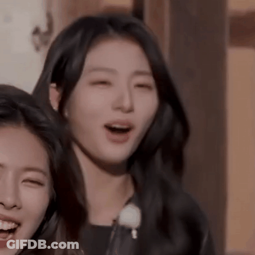 Two Women Laughing One In Leather Jacket GIF