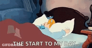 Two Women Laying On Bed With Stuffed Rabbit GIF