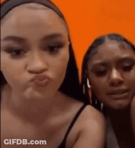 Two Women Making Faces GIF