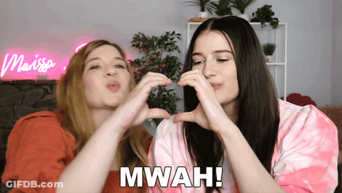 Two Women Making Heart Shape GIF