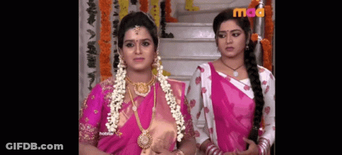 Two Women Next To Each Other GIF