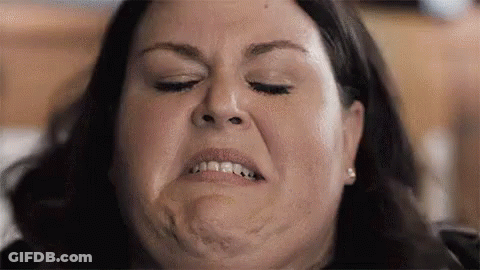 Two Women On Couch, One Messy Hairdo GIF
