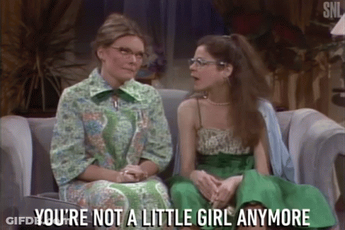 Two Women On Couch Saying You're Not A Little Girl Anymore GIF