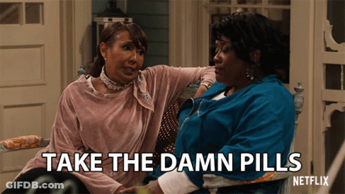 Two Women On Porch Saying Take The Damn Pills GIF