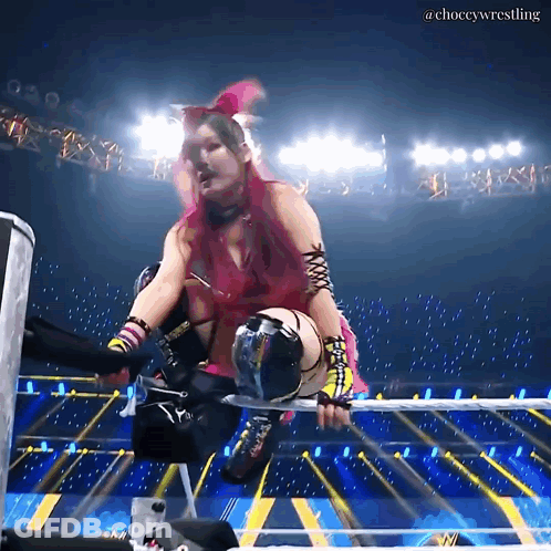 Two Women One Holding M&M's Candy Bar GIF