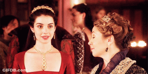Two Women One In Red Dress GIF