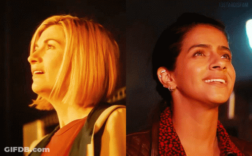 Two Women One Smiling One Looking Up GIF
