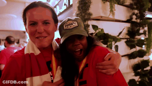 Two Women Posing One Wearing Puma Hat GIF