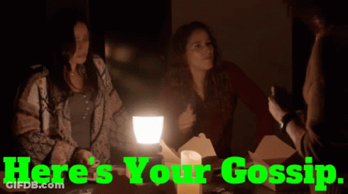 Two Women Saying Here's Your Gossip GIF