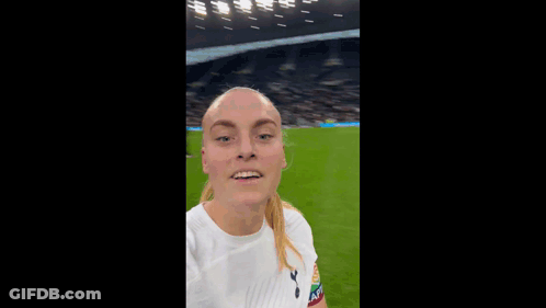 Two Women Selfie Soccer Field One Tottenham Shirt GIF