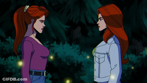 Two Women Shaking Hands In Front Of A Forest GIF