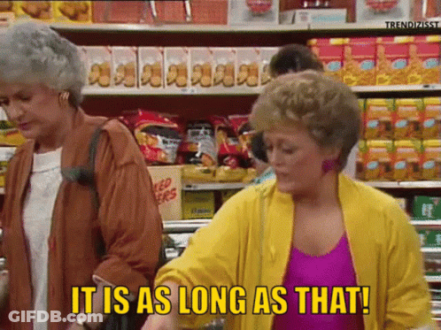 Two Women Shopping Grocery Store Saying It's That Long GIF