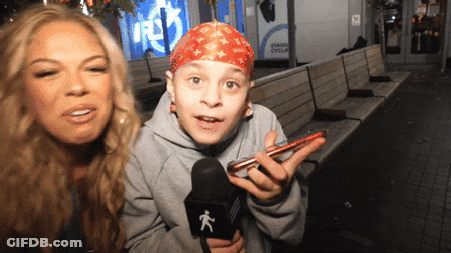 Two Women Shouting Outside Building GIF