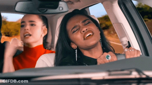 Two Women Singing In Car GIF