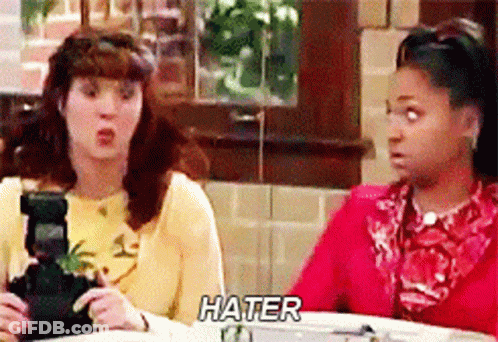 Two Women Sitting At Table Hater GIF