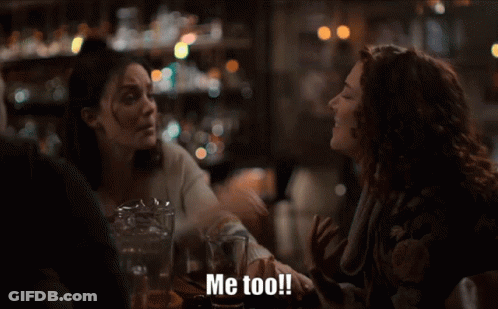 Two Women Sitting At Table Saying Me Too GIF