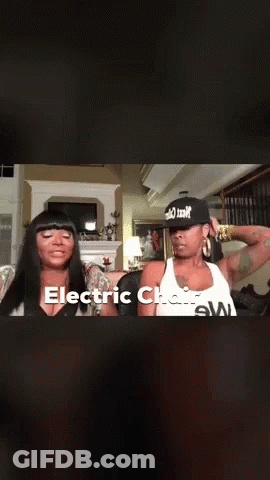 Two Women Sitting In Living Room Electric Chair GIF