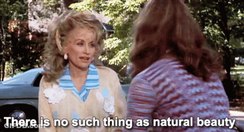 Two Women Sitting Next To Car Talking GIF