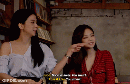 Two Women Sitting Next To Each Other GIF