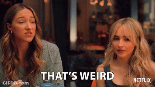 Two Women Sitting Next To Each Other Saying That's Weird GIF