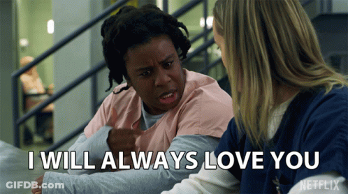 Two Women Sitting Next To Each Other With The Words I Will Always Love You GIF