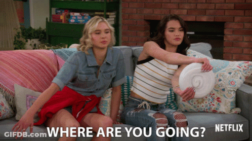 Two Women On Couch With Where Are You Going Text GIF