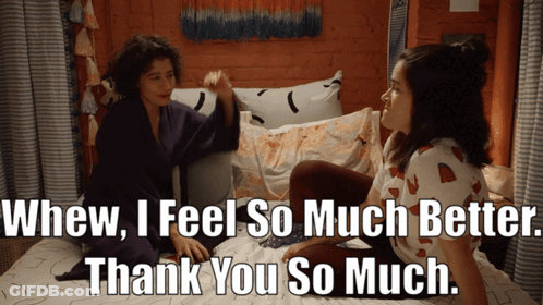 Two Women Sitting On Bed Thanking GIF