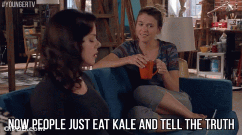 Two Women Sitting On Couch Now People Just Eat Kale And Tell The Truth GIF