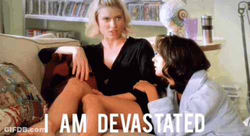 Two Women Sitting On Couch Saying I Am Devastated GIF