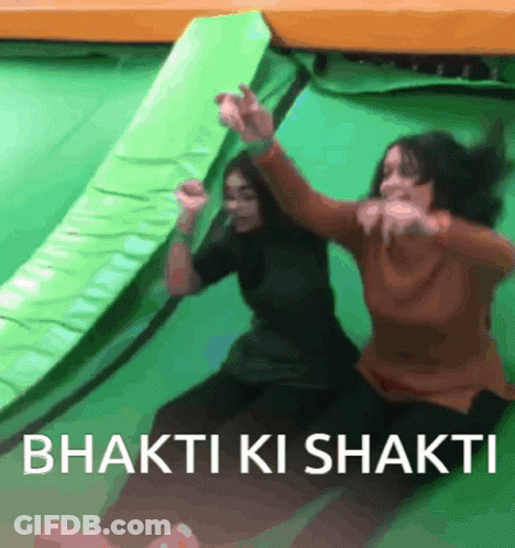 Two Women Sitting On Green Trampoline Bhakti Ki Shakti GIF