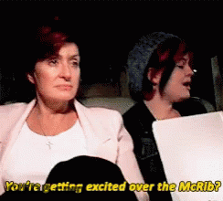 Two Women Sitting One Says You're Getting Excited Over The McRib GIF