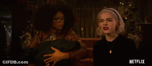 Two Women Sitting With Netflix Logo GIF