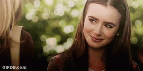 Two Women Smiling At Camera GIF