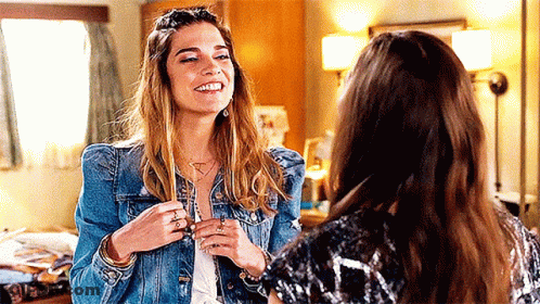 Two Women Smiling At Each Other GIF