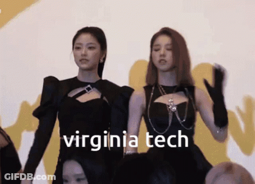 Two Women Standing Beside Virginia Tech GIF